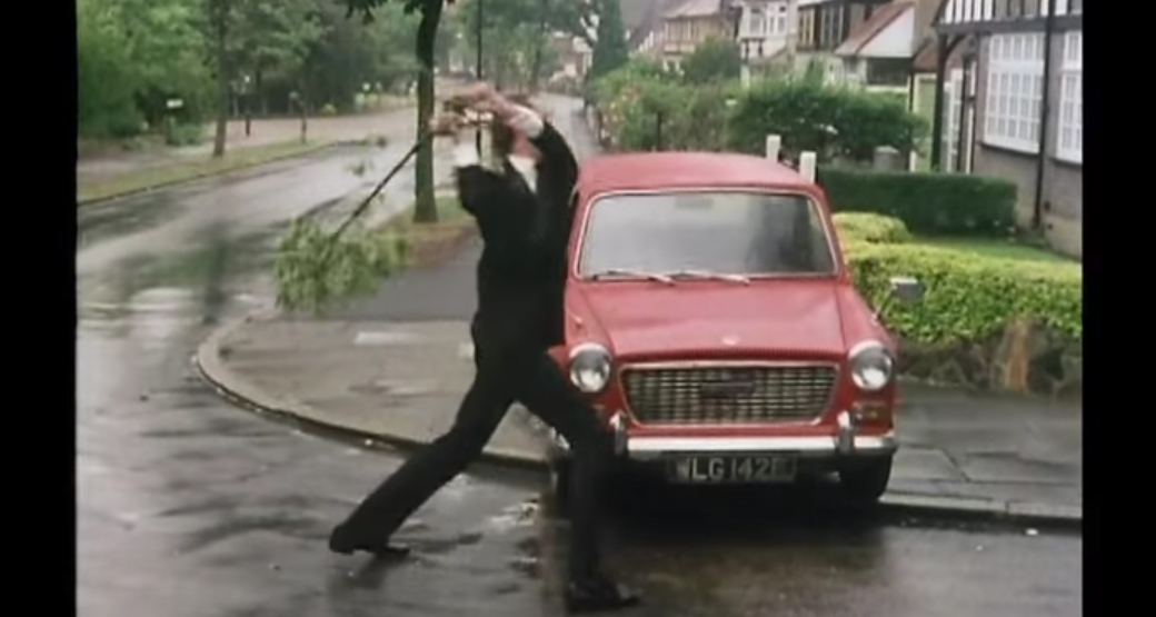 fawlty-towers-beating-his-mini