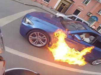 Rubbish BMW, 5 Series on fire in Russia, dailycarblog.com