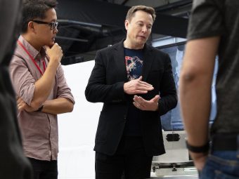 Elon Musk in meeting, very serious