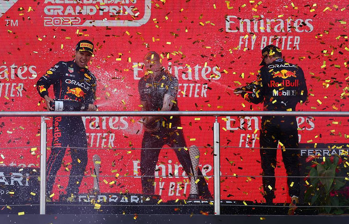 2022 Azerbaijan Grand Prix - Max Verstappen and Sergio perez celebrate on the podium