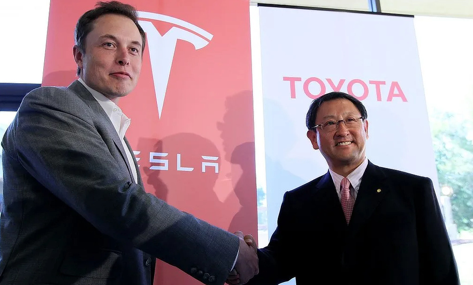 Toyota and Tesla CEO shake hands - when good times go bad