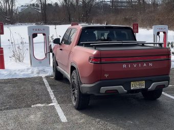 Rivian R1 using a Tesla supercharger