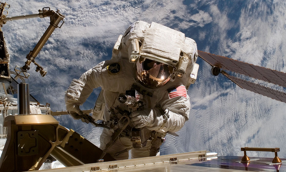 Sunita WIlliams, NASA Flight Engineer performing a space walk on the international Space Station.