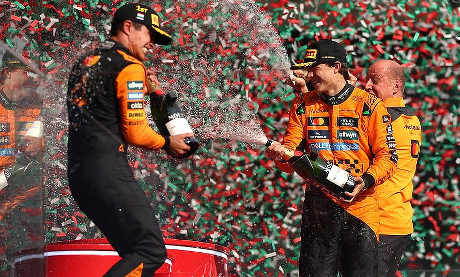 2025 Hungarian Grand Prix - Lando Norris celebrates win on winners rostrum